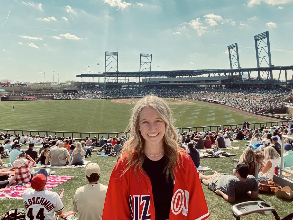 Paityn standing in a stadium at Spring training 